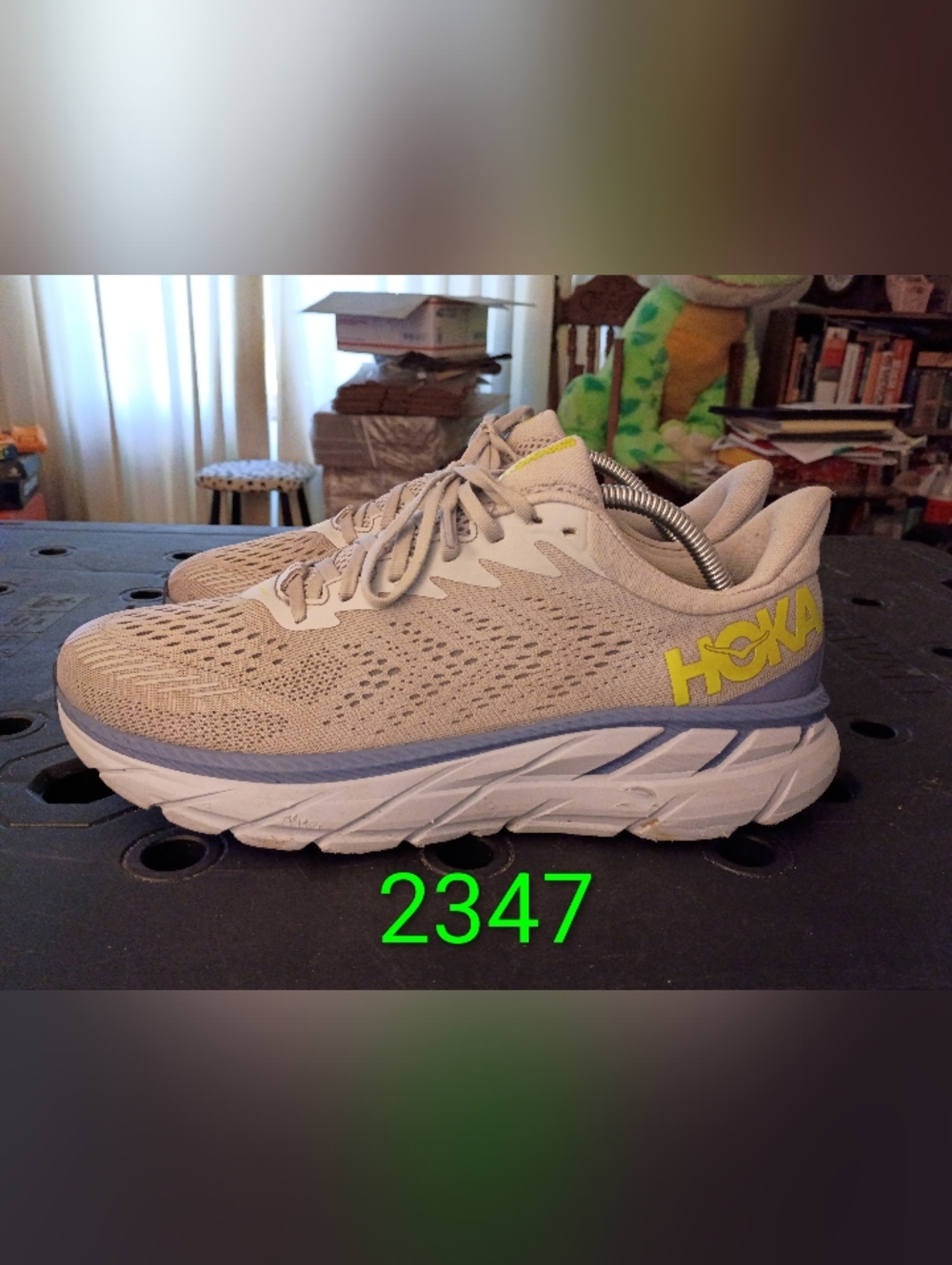 Hoka One One Clifton 7 Neutral Running Shoe in Light Gray with Yellow Logo